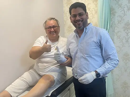 Orthopedic Doctor with joint replacement patient